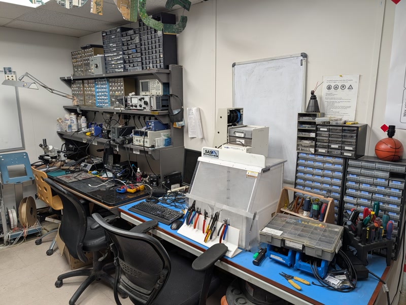 Electronics workbench with test equipment and components