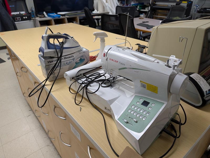 Sewing machine workstation and shared work tables